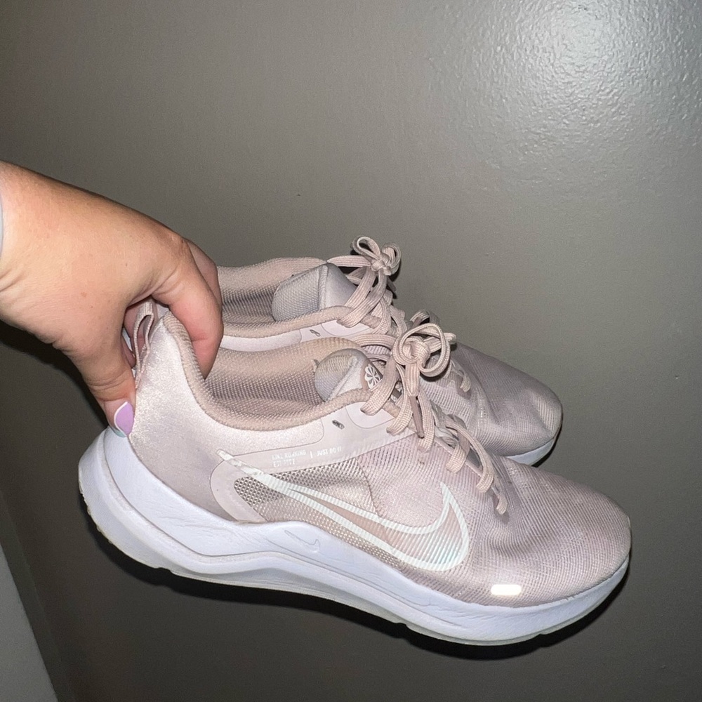 Nike Pink Sneakers with Mesh Upper and Metallic Accents